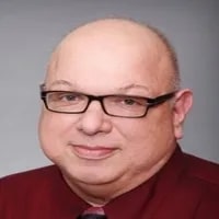 Fred Winchar, Founder, Certified HR professional, Max Cash seen posing for a photo